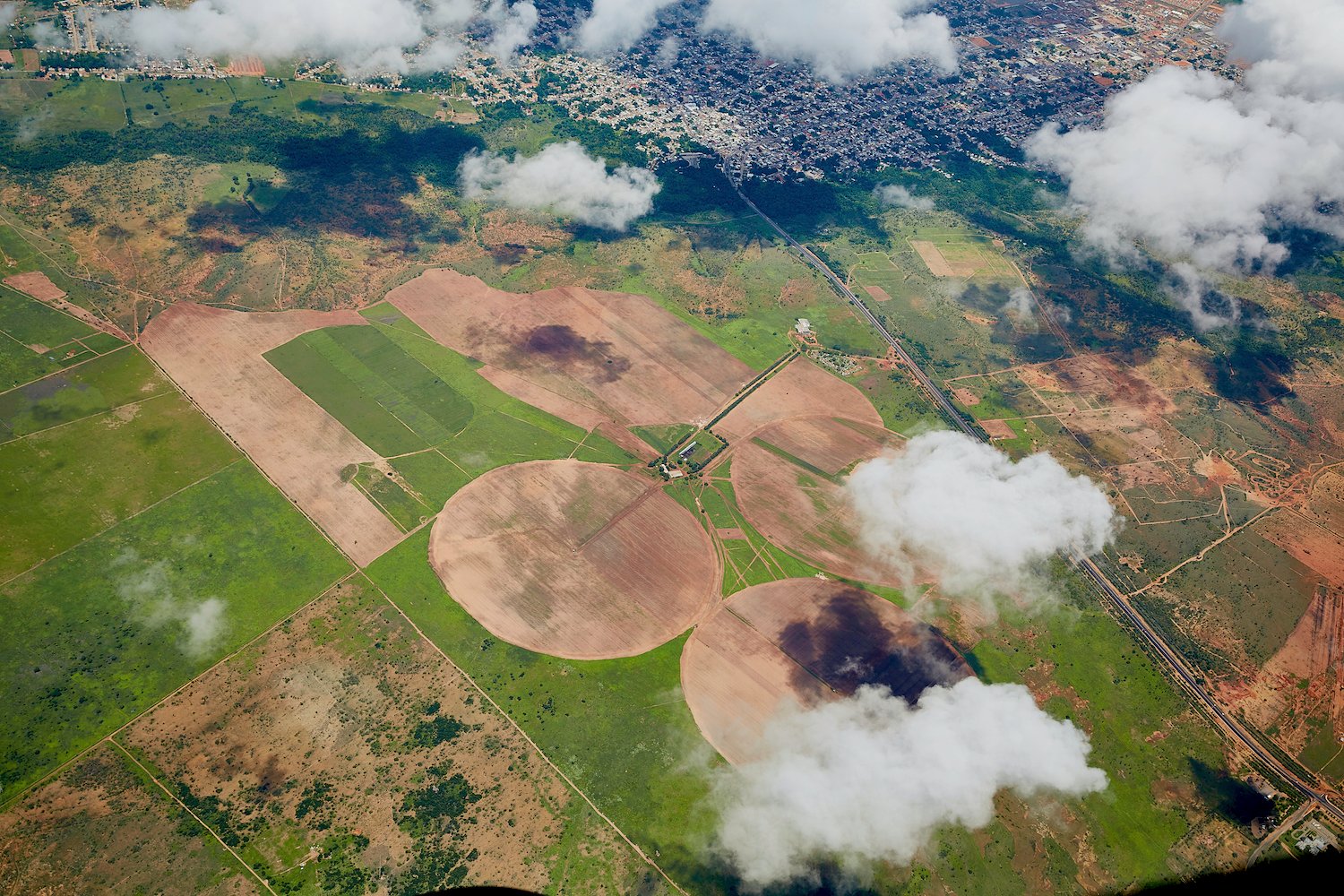 aerial pivot fields with clouds