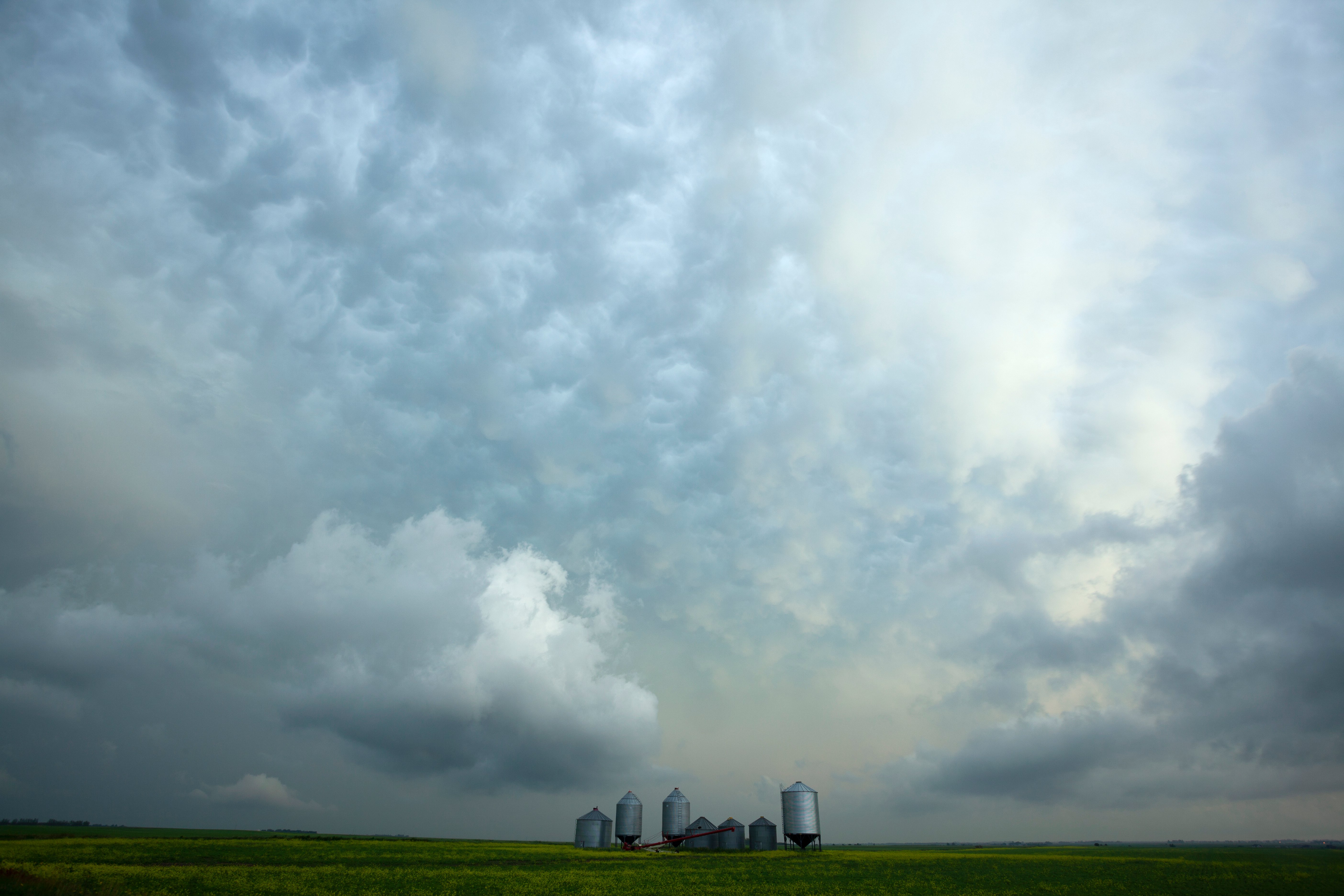 farm landscape with storm incoming